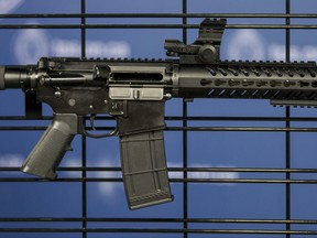 Following the execution of five search warrants and three arrests, police display seized firearms at Toronto Police Service headquarters in Toronto, Ont.  on Wednesday January 25, 2017. Ernest Doroszuk/Toronto Sun/Postmedia Network