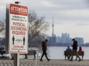 Pandemic protocol sign in the Humber Bay Shores neighbourhood in Toronto, Ont. on Thursday March 11, 2021. Ernest Doroszuk/Toronto Sun/Postmedia