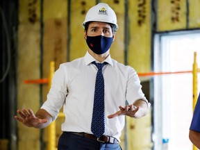 Prime Minister Justin Trudeau visits a construction site in Ottawa to highlight affordable housing policies on June 30, 2021.