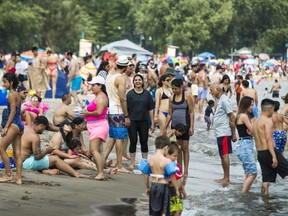 People flocked to Woodbine Beach on Sunday July 25, 2021. With the threat of a fourth wave looming, columnist Liz Braun cautions that we should not become too complacent.