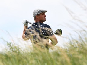 Bryson DeChambeau watches his drive from the 9th tee during his first round of The 149th Open Championship at Royal St George's.