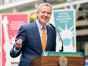 New York Mayor Bill de Blasio speaks during the opening of the Broadway vaccination site in New York April 12, 2021.