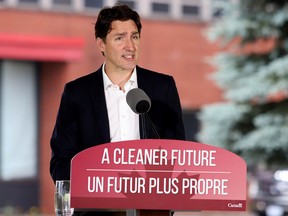 Prime Minister Justin Trudeau speaks after touring the Algoma Steel plant in Sault Ste. Marie, Ontario, July 5, 2021.  (Gino Donato/Pool via REUTERS)