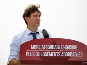 Prime Minister Justin Trudeau delivers remarks at a press conference at a housing construction site in Brampton on July 19, 2021.