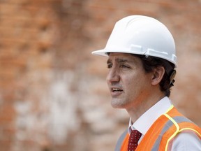 Canada's Prime Minister Justin Trudeau speaks during a press conference at an under construction affordable housing complex in Hamilton, Ont., Tuesday, July 20, 2021.