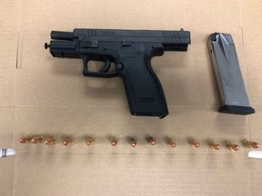 Police officers investigating drug dealing in the Markham Rd.-Lawrence Ave. E. area, say they seized this gun and ammunition.