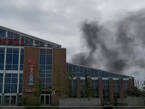 Smoke rises from the roof of the Pacific Mall in Markham.