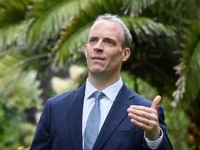 Britain's Foreign Secretary Dominic Raab gestures during an interview with Reuters on the sidelines of G7 summit in Carbis Bay, Cornwall, England, June 11, 2021.