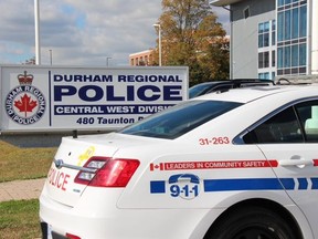 Police cruiser in front of Durham Regional Police Central West Division.