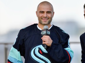 Mark Giordano is selected by the Seattle Kraken during the 2021 NHL Expansion Draft at Gas Works Park on July 21, 2021 in Seattle, Washington.