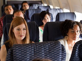 A reader's awkward incident on a plane sounds like a schoolyard dispute.