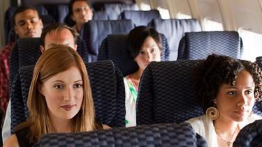 A reader's awkward incident on a plane sounds like a schoolyard dispute.