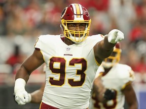 Defensive end Jonathan Allen of the Washington Redskins reacts during the NFL game against the Arizona Cardinals at State Farm Stadium on September 9, 2018 in Glendale, Arizona.