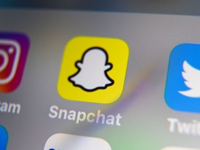 Logo of mobile app Snapchat displayed on a tablet.