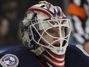 Matiss Kivlenieks of the Columbus Blue Jackets tends net in his first NHL game against the New York Rangers at Madison Square Garden in New York City, Jan. 19, 2020.