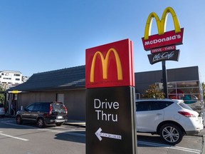 Customers queue up for the drive-thru at a McDonald's restaurant.