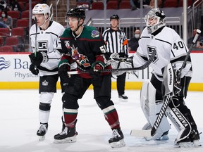 Michael Bunting plants himself in fron of Kings goalie Calvin Petersen during a game at Gila River Arena on May 05, 2021 in Glendale, Arizona.