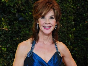 Oscar-nominated actress Linda Blair poses on arrival at the 3rd Annual Governors Awards in Hollywood on Nov. 12, 2011 in southern California.