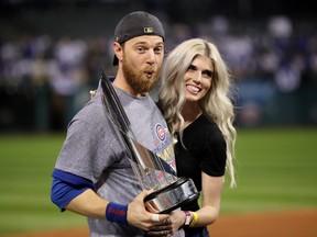 2016 World Series MVP Ben Zobrist of the Chicago Cubs celebrates with his wife Julianna Zobrist after defeating the Cleveland Indians 8-7 in Game Seven of the 2016 World Series at Progressive Field on Nov. 2, 2016 in Cleveland, Ohio.