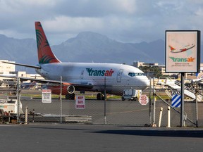 A Transair Boeing 737 cargo jet sits on the tarmac at the Transair Cargo Facility at the Dainel K. Inouye Internaional Airport on July 2, 2021 in Honolulu, Hawaii.