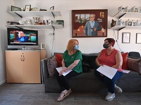 Ballymurphy family members Eileen McKeown (left) and Mary Corr at Springhill Community House await the announcement on July 14, 2021 in Belfast, Northern Ireland.