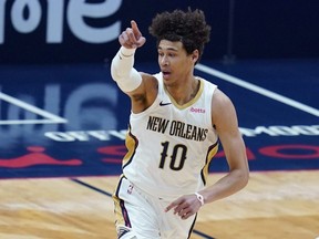 Pelicans centre Jaxson Hayes reacts after his slam dunk in the first half of an NBA game against the Kings in New Orleans, April 12, 2021.