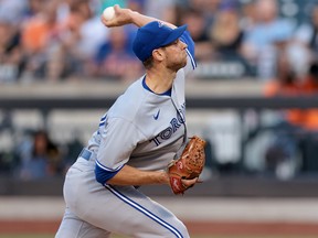 Toronto Blue Jays starting pitcher Steven Matz (22) delivers a pitch against the New York Mets at Citi Field.