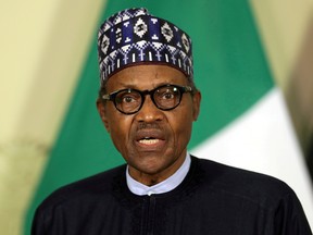 Nigerian President Muhammadu Buhari speaks during a news conference during a visiit to Pretoria, South Africa, October 3, 2019.