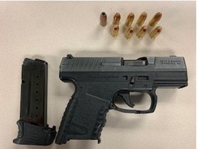 Handgun seized by officers