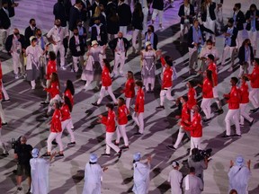 Athletes from Canada take part in the opening ceremony