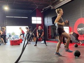 Members working out in class