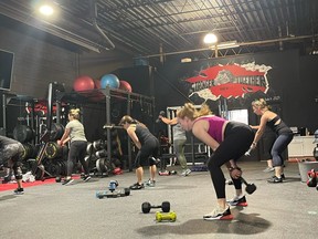 Members working out in class