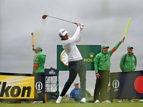 Patrick Cantlay tees off on the ninth hole on Wednesday during a practice round for the 149th Open Championship at Royal St George's, in south-east England.