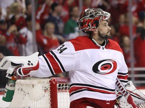Goalie Petr Mrazek of the Carolina Hurricanes looks on after allowing a goal against the Washington Capitals at Capital One Arena on April 20, 2019 in Washington, D.C.