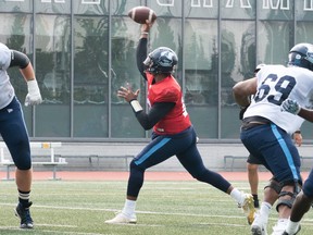 QB Antonio Pipkin steps up into the pocket to throw the ball during Argonauts training in Guelph.