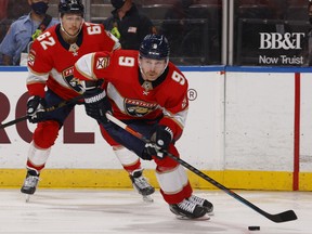 Sam Bennett of the Florida Panthers handles the puck against the Columbus Blue Jackets at the BB&T Center on April 19, 2021 in Sunrise, Florida.