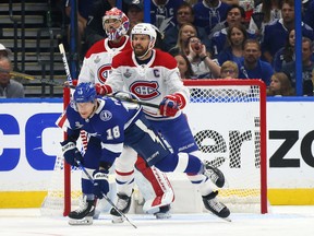 Montreal Canadiens defenceman Shea Weber clears away Ondrej Palat of the Tampa Bay Lightning from in front of goaltender Carey during the Stanley Cup final series. The Seattle Kraken could select Weber or Price in the expansion draft.