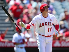 Los Angeles Angels designated hitter Shohei Ohtani (17) reacts after hitting a solo home run against the Baltimore Orioles at Angel Stadium.