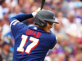 American League starting pitcher Shohei Ohtani of the Los Angeles Angels hits against the National League during the first inning of the 2021 MLB All Star Game at Coors Field in Denver, Colo., July 13, 2021.