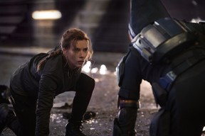 Natasha Romanoff (Scarlett Johansson) squares off against the Taskmaster in a scene from Black Widow.