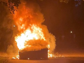 Tesla Inc's new Model S Plaid electric car is seen in flames in Pennsylvania in this handout photo provided to Reuters on July 2, 2021. According to an attorney for the driver, the car went into flames while the owner was driving it on Tuesday, three days after it was delivered.