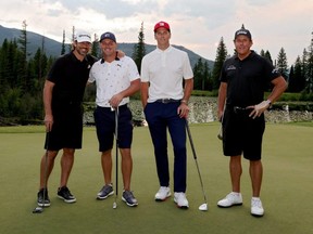 From left to right, Aaron Rodgers, Bryson DeChambeau, Tom Brady, and Phil Mickelson pose for photos after Capital One's The Match at The Reserve at Moonlight Basin in Big Sky, Montana, Tuesday, July 6, 2021.