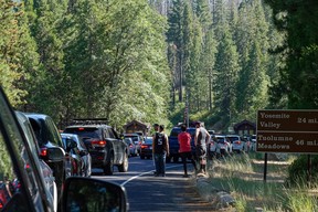 Traffic forms at the Big Oak Flat entrance as visitors arrive for the Fourth of July weekend in Yosemite National Park, California, U.S., July 2, 2021.