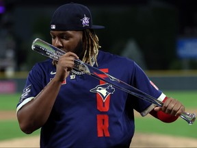 Vladimir Guerrero Jr. of the Toronto Blue Jays celebrates after being named the Ted Williams Most Valuable Player during the 91st MLB All-Star Game at Coors Field on July 13, 2021 in Denver.