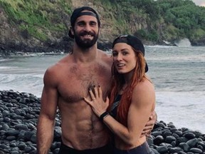 Becky Lynch and Seth Rollins.