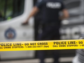 The scene outside the City Hall parking garage where Toronto Police Const. Jeffrey Northrup was killed on Friday July 2, 2021.