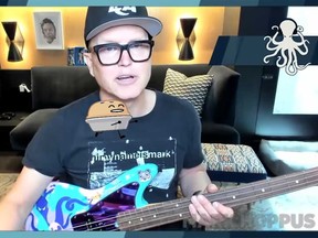 Blink-182's Mark Hoppus  is seen playing guitar for the first time since his cancer diagnosis.
