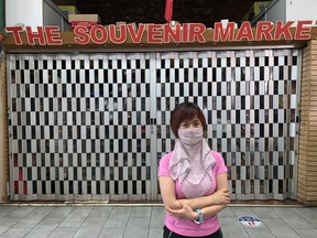 Jenny Huang, owner of The Souvenir Market, closed up her shop in the St. Lawrence Market for the last time on Saturday, July 31, 2021.