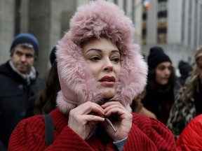 Rose McGowan arrives to speak to reporters outside New York Criminal Court on the first day of film producer Harvey Weinstein's sexual assault trial in the Manhattan borough of New York City, New York, U.S., January 6, 2020. REUTERS/Jeenah Moon/File Photo ORG XMIT: FW1