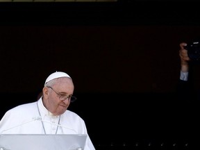 Pope Francis leads the Angelus prayer from a balcony of the Gemelli hospital, as he recovers following scheduled surgery on his colon, in Rome, Italy, July 11, 2021.